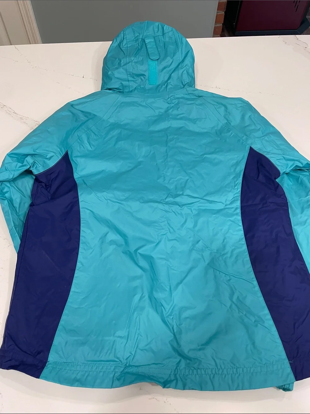 Columbia Turquoise Hooded Rain Jacket with Navy Panels